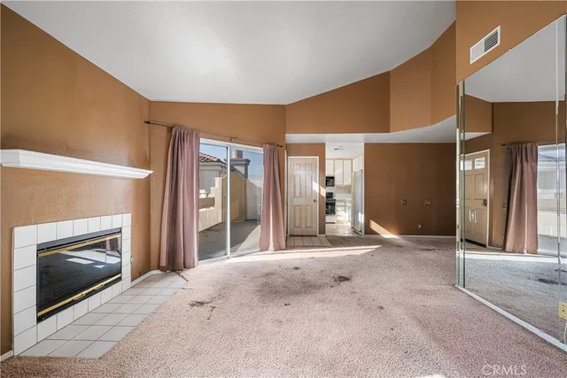 a view of a livingroom with a fireplace