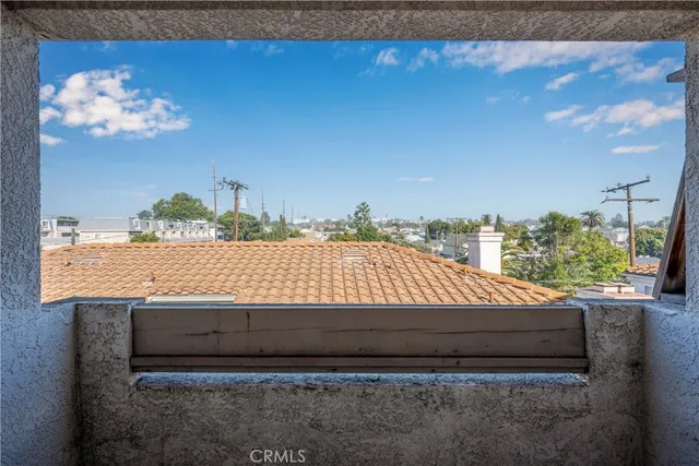 a view of a balcony with an outdoor space