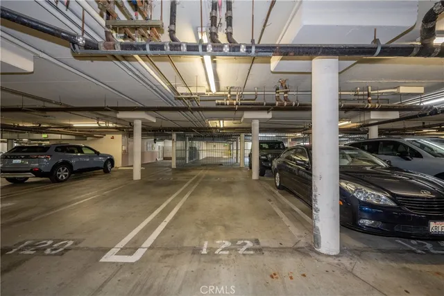 a view of a street with cars on road
