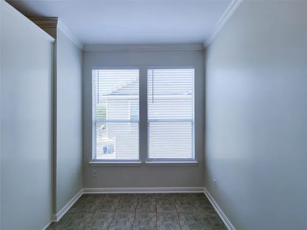 a view of a room that has a window in it