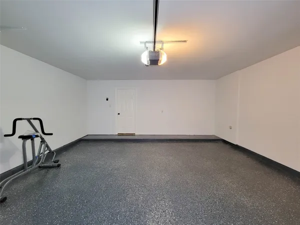 a view of a room with cabinet and mirrors