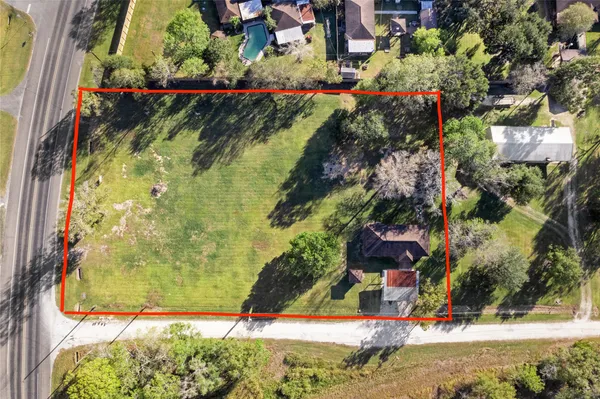 a view of swimming pool with a yard