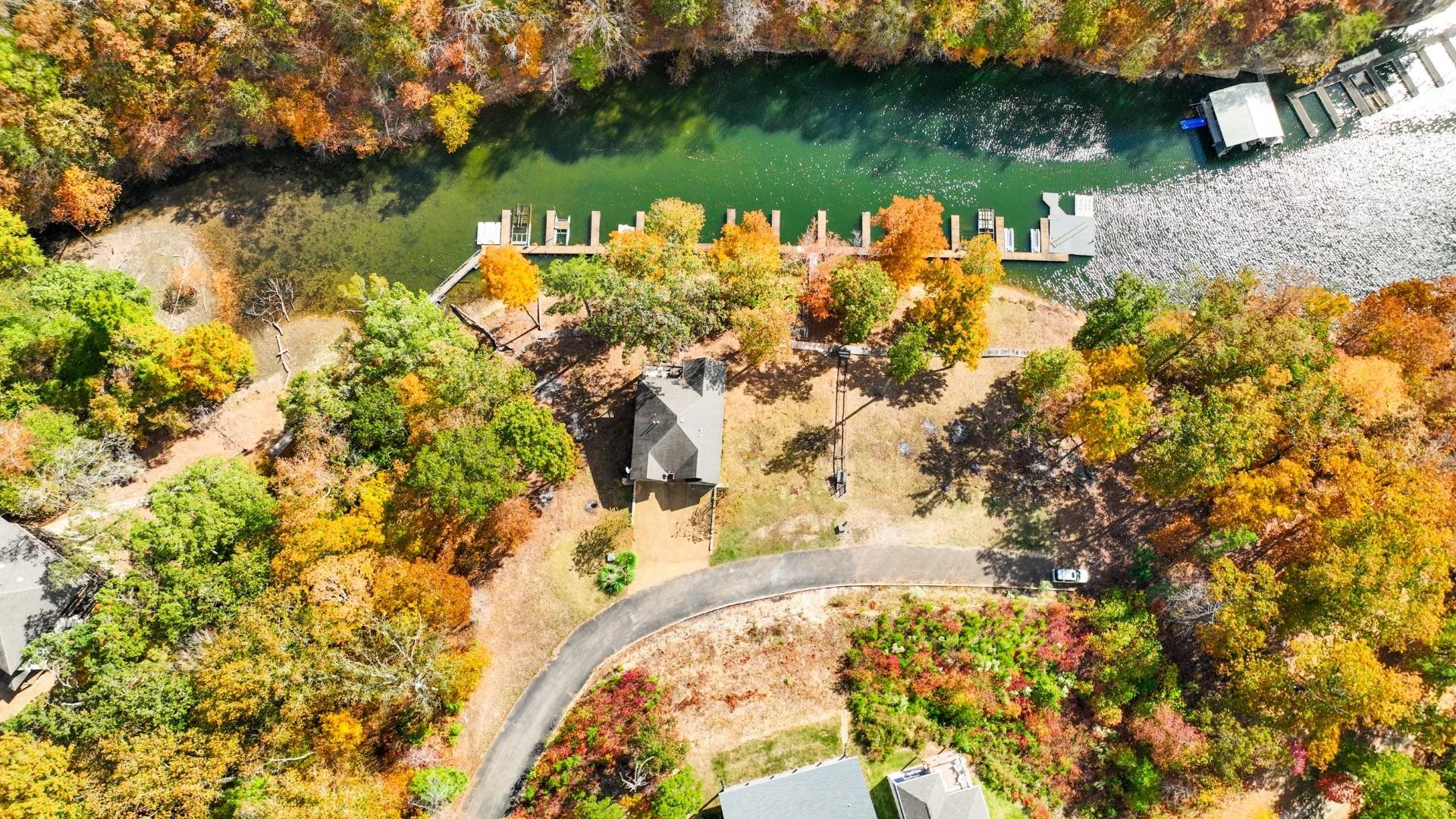 123 Breeze Point Savannah, TN 38372 - Photo 13 of 32 a view of a lake with a yard