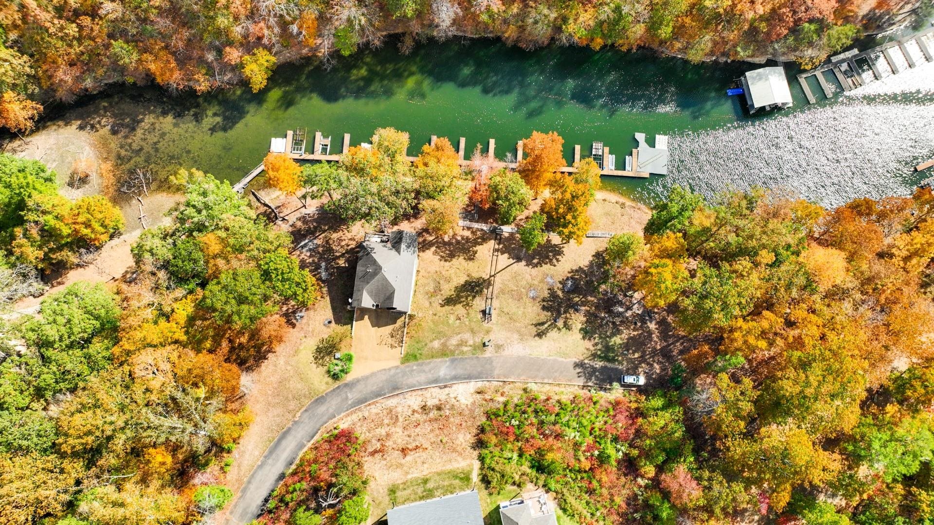 123 Breeze Point Savannah, TN 38372 - Photo 14 of 32 a view of a lake from a yard