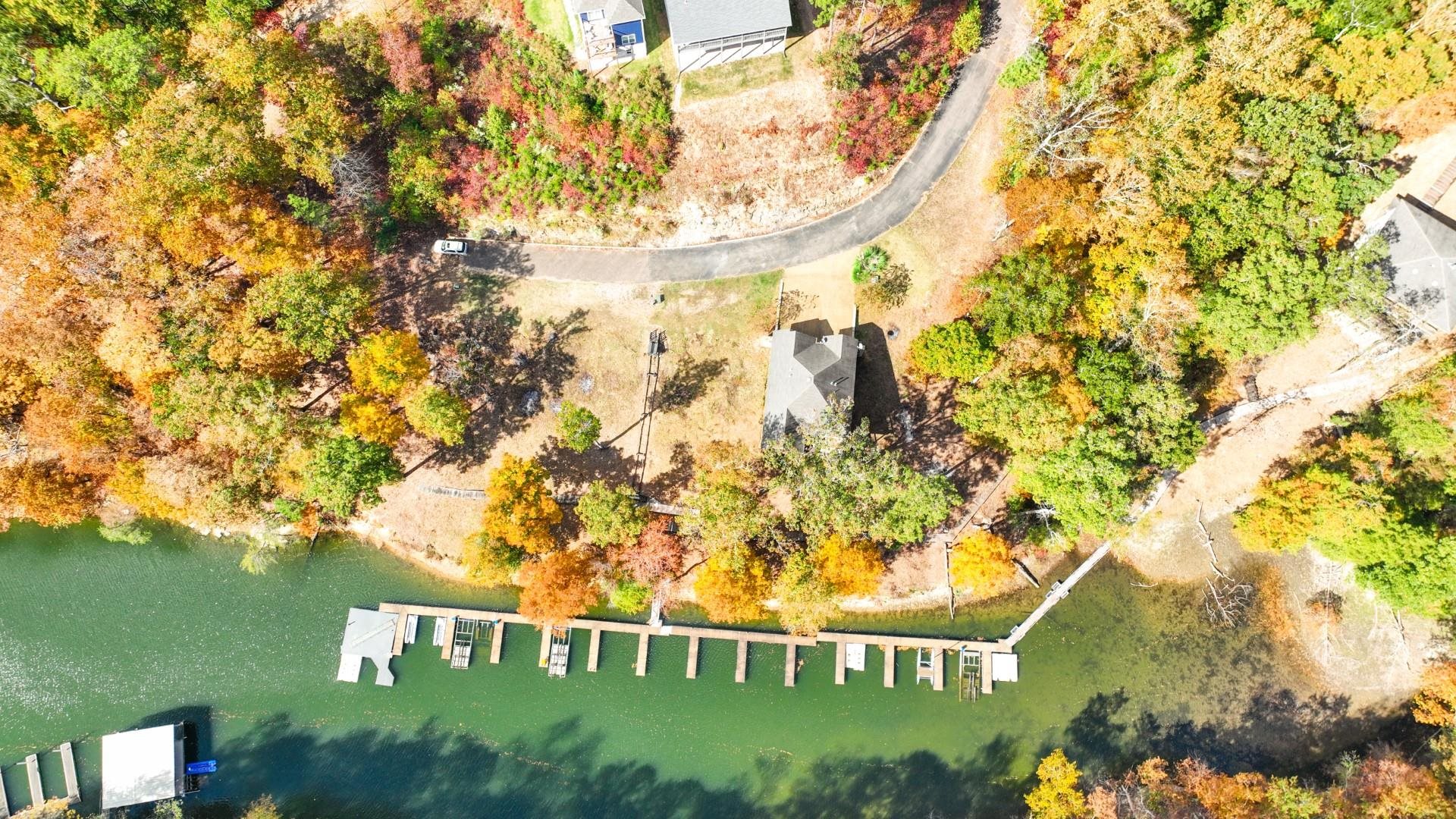 123 Breeze Point Savannah, TN 38372 - Photo 17 of 32 a view of a sign of a tree
