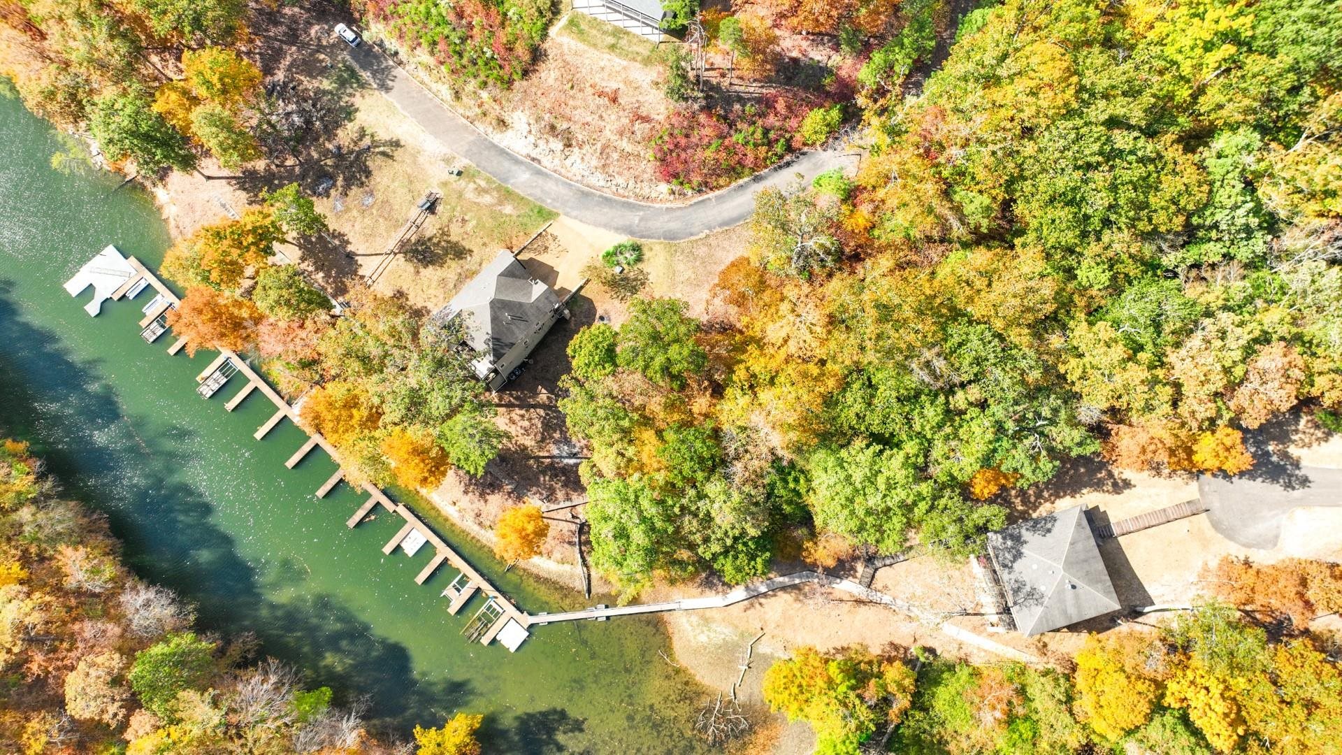 123 Breeze Point Savannah, TN 38372 - Photo 10 of 32 a view of swimming pool from a lake view