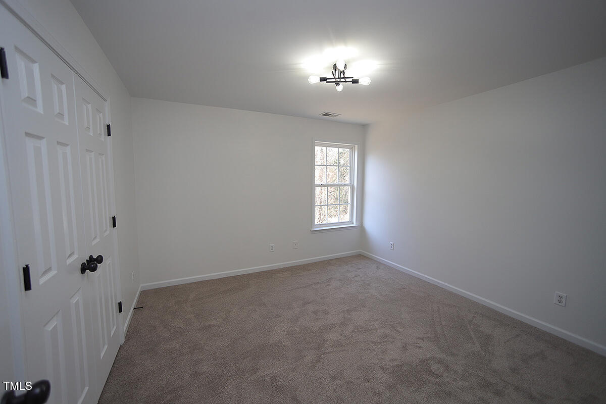 3244 Marcony Way Raleigh, NC 27610 - Photo 20 of 30 Bedroom 2 w/ adjoining french doors for limitless options! (bedroom, nursery, private den, glam room, man cave, gym etc)
