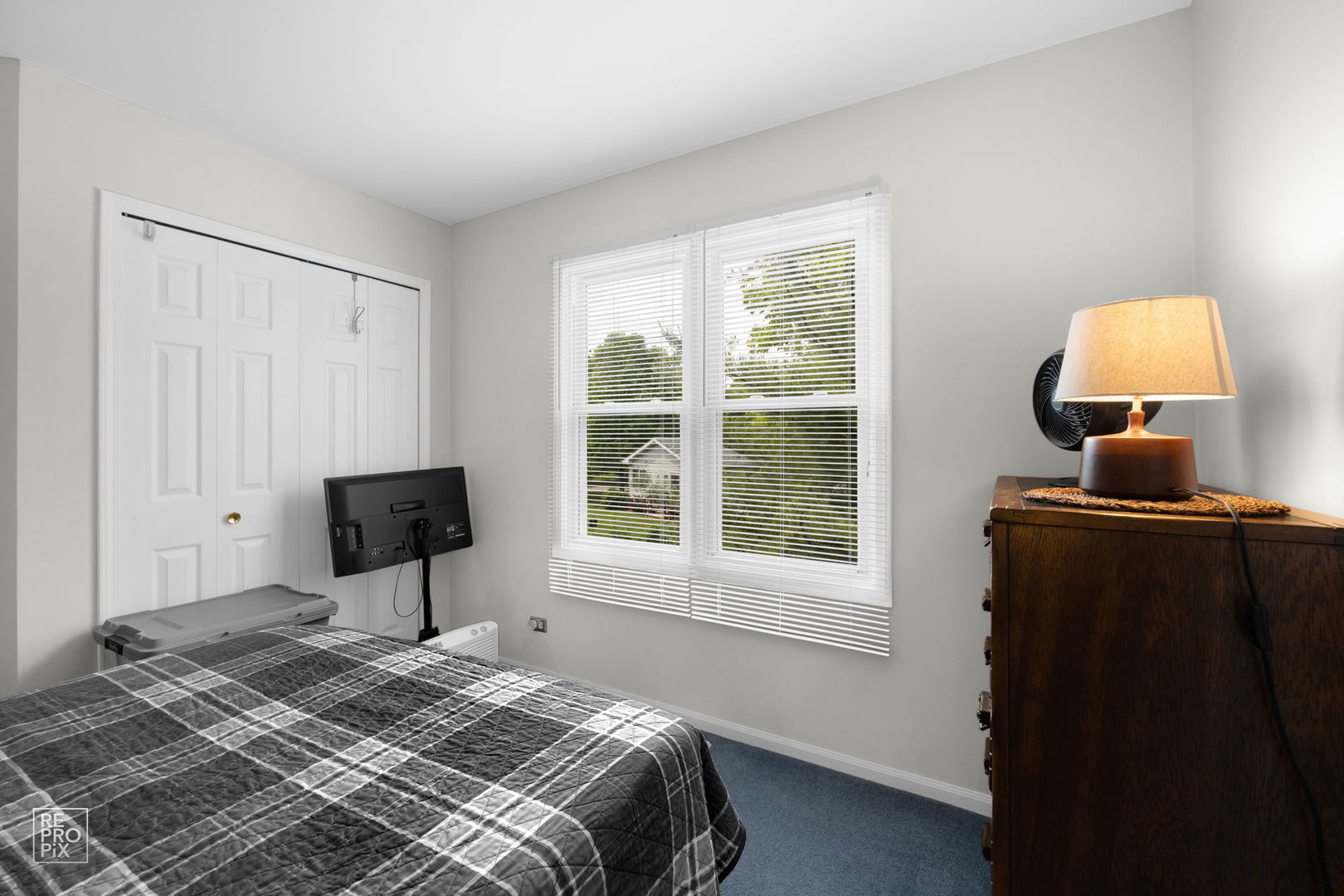 720 Small Court Naperville, IL 60563 - Photo 18 of 25 a bedroom with a bed and a window