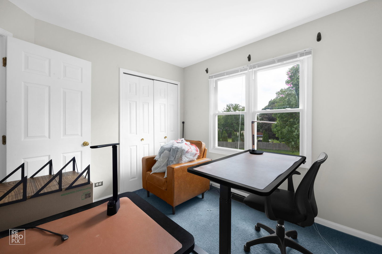 720 Small Court Naperville, IL 60563 - Photo 19 of 25 a living room with furniture and a window