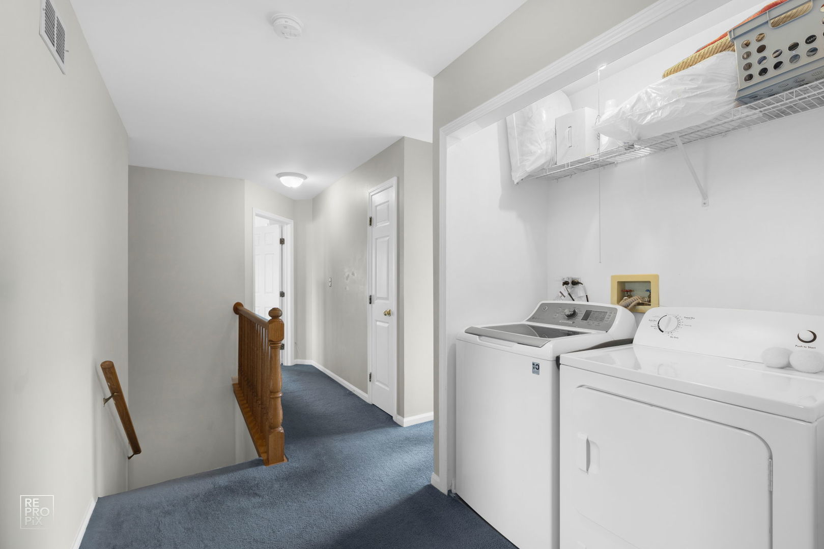 720 Small Court Naperville, IL 60563 - Photo 22 of 25 a view of storage and utility room with washer and dryer