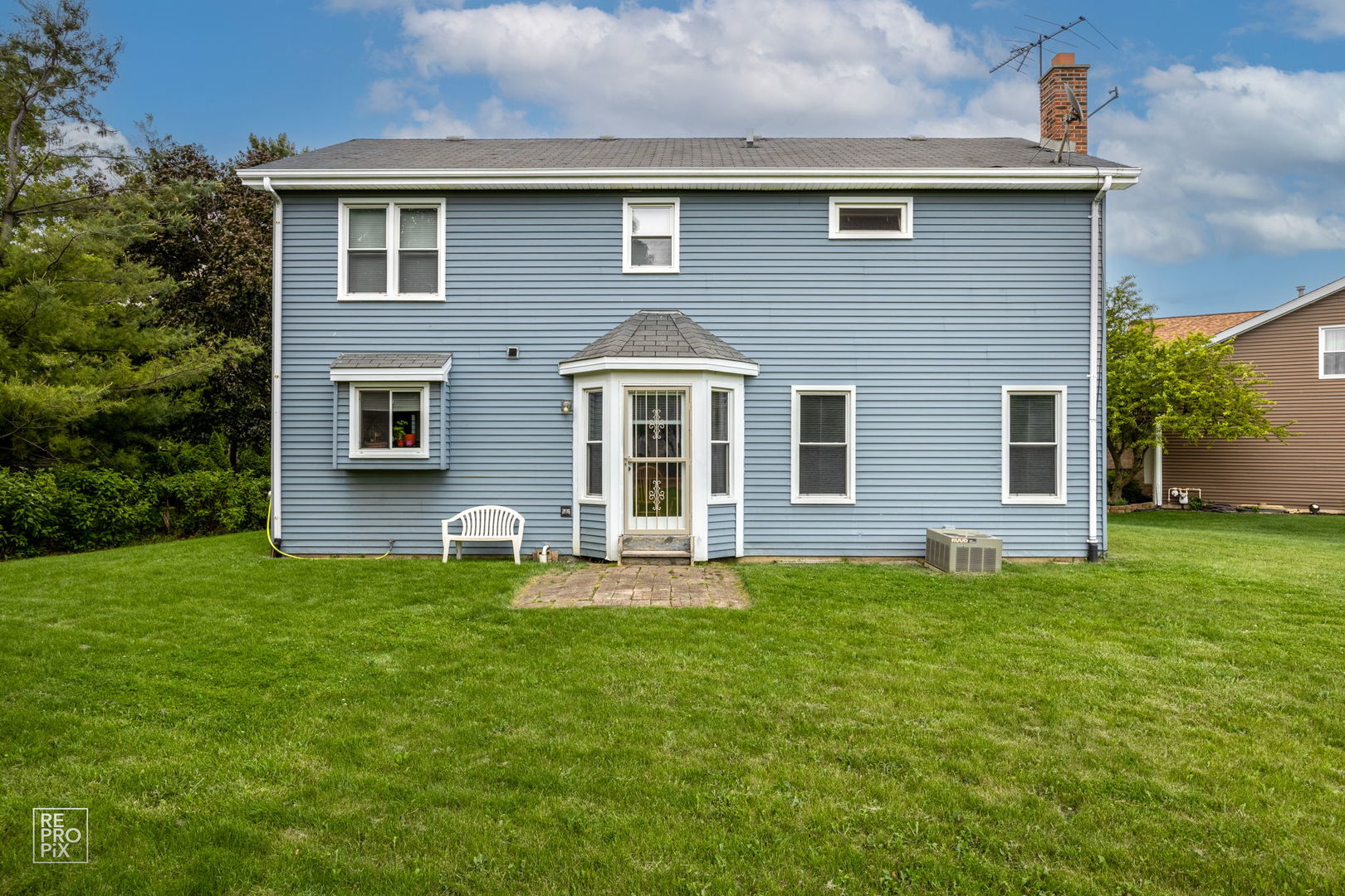 720 Small Court Naperville, IL 60563 - Photo 24 of 25 a front view of a house with a yard