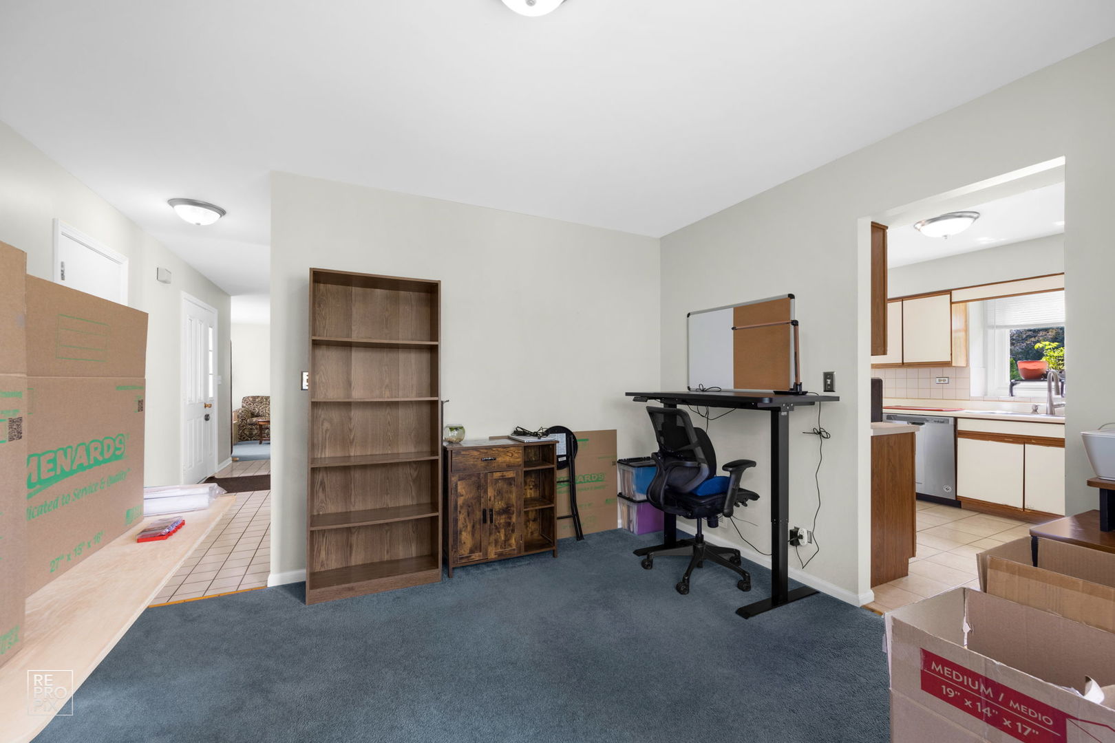 720 Small Court Naperville, IL 60563 - Photo 9 of 25 a view of a workspace with furniture and empty room