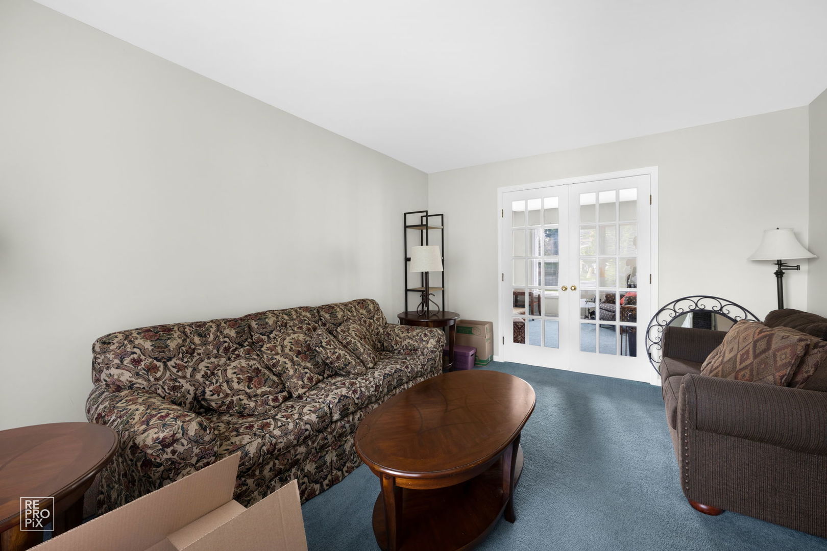720 Small Court Naperville, IL 60563 - Photo 10 of 25 a living room with furniture and a couch