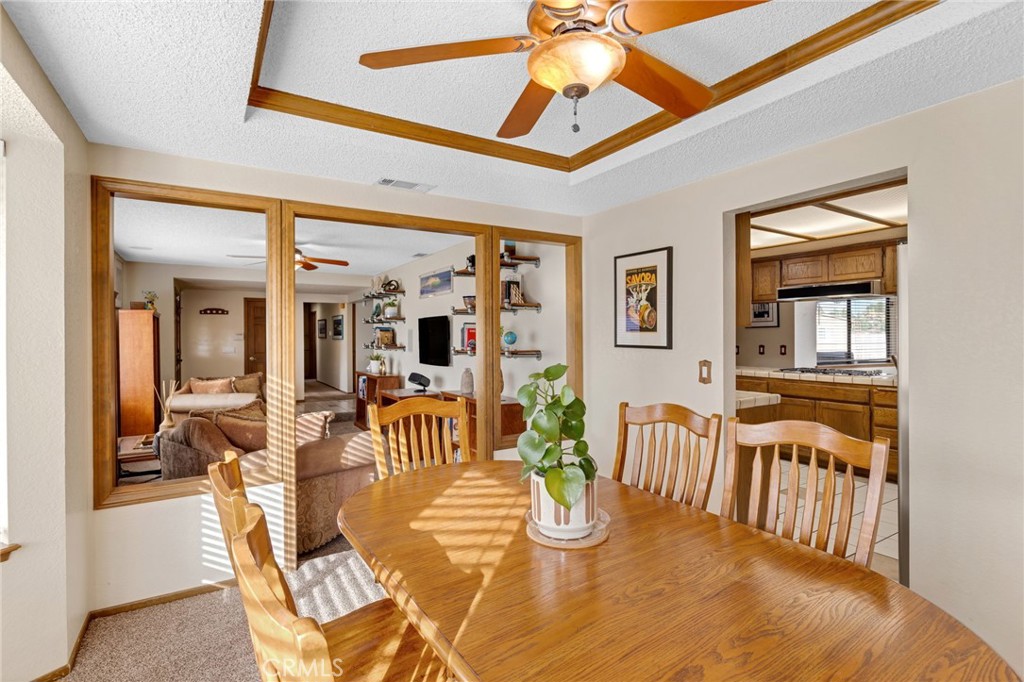 20360 Ituma Road Apple Valley, CA 92308 - Photo 14 of 66 a view of a dining room with furniture