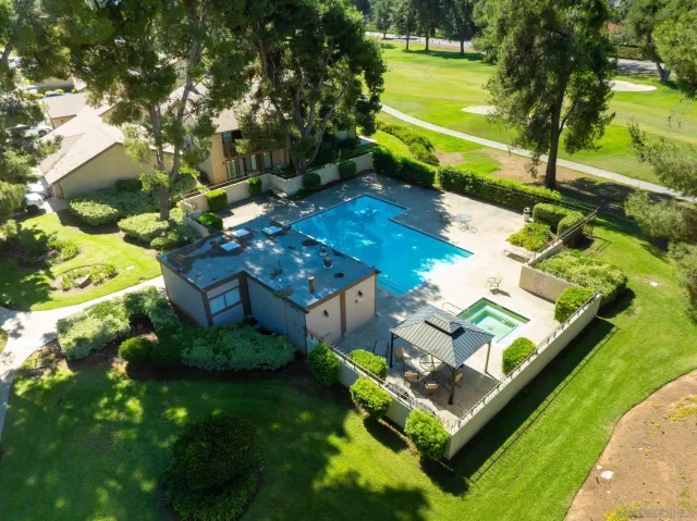 a view of a backyard with plants
