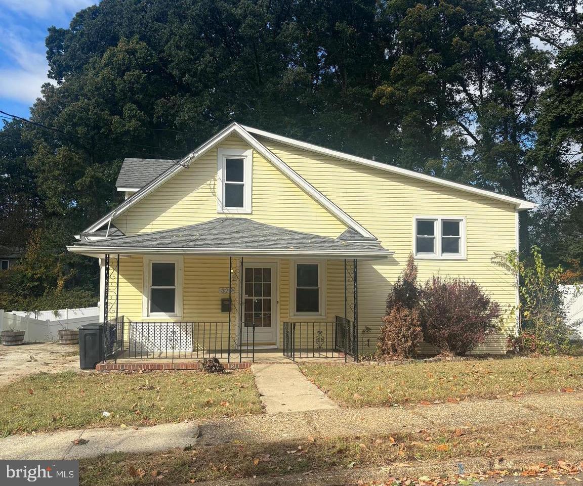 329 Union Avenue Runnemede, NJ 08078 - Photo 1 of 29 a front view of a house with a garden