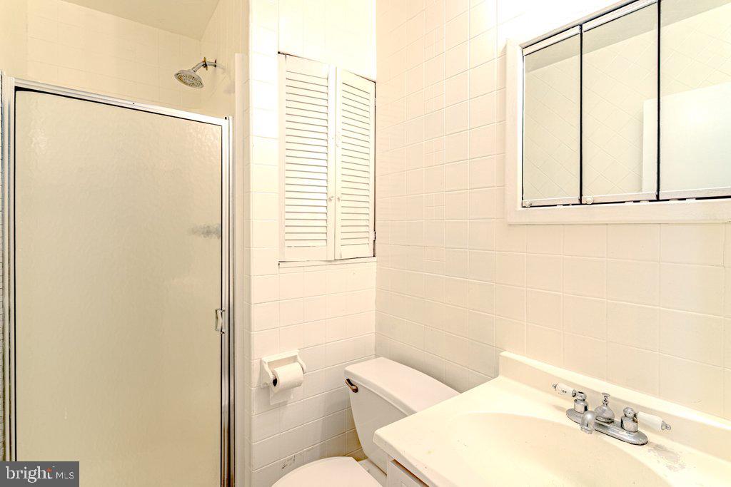 329 Union Avenue Runnemede, NJ 08078 - Photo 15 of 29 a bathroom with a toilet sink and shower