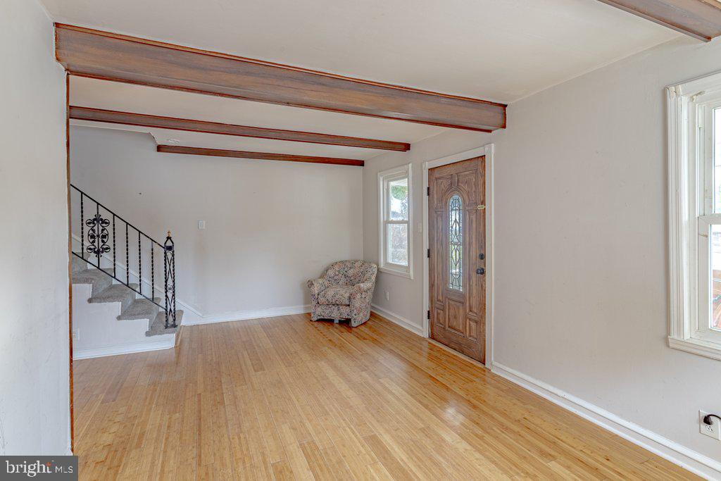 329 Union Avenue Runnemede, NJ 08078 - Photo 3 of 29 a room with wooden floor and windows