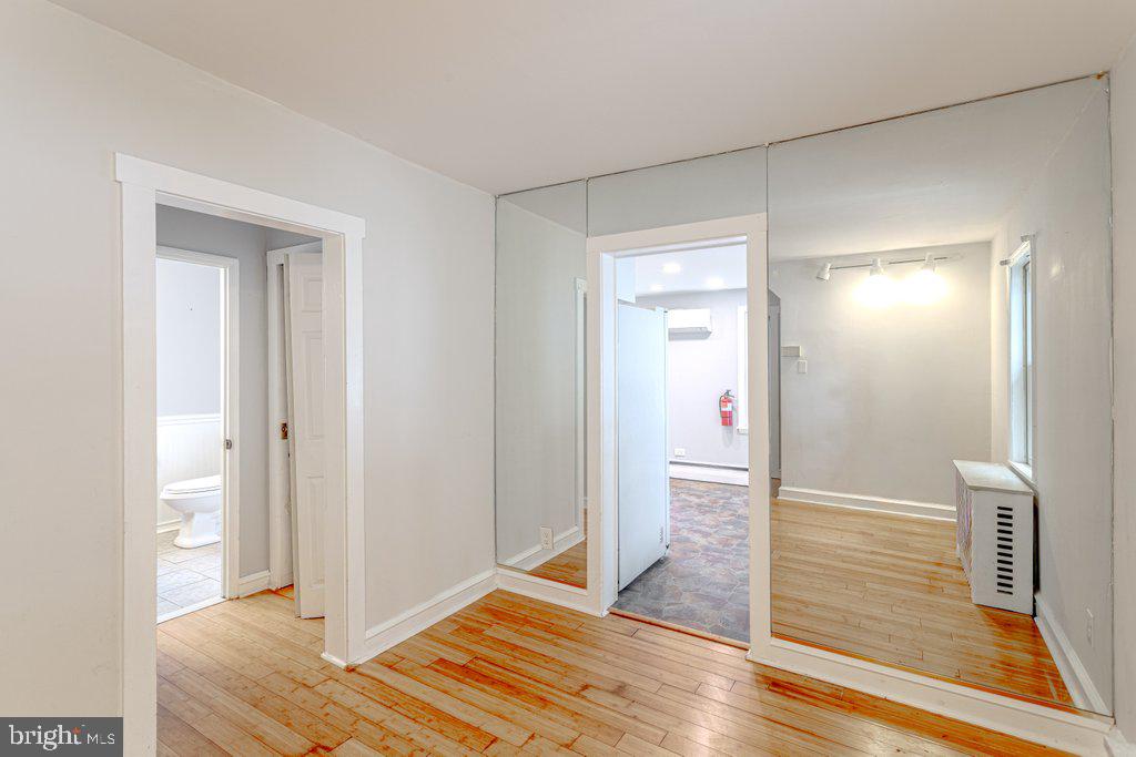 329 Union Avenue Runnemede, NJ 08078 - Photo 5 of 29 a view of a hallway with wooden floor