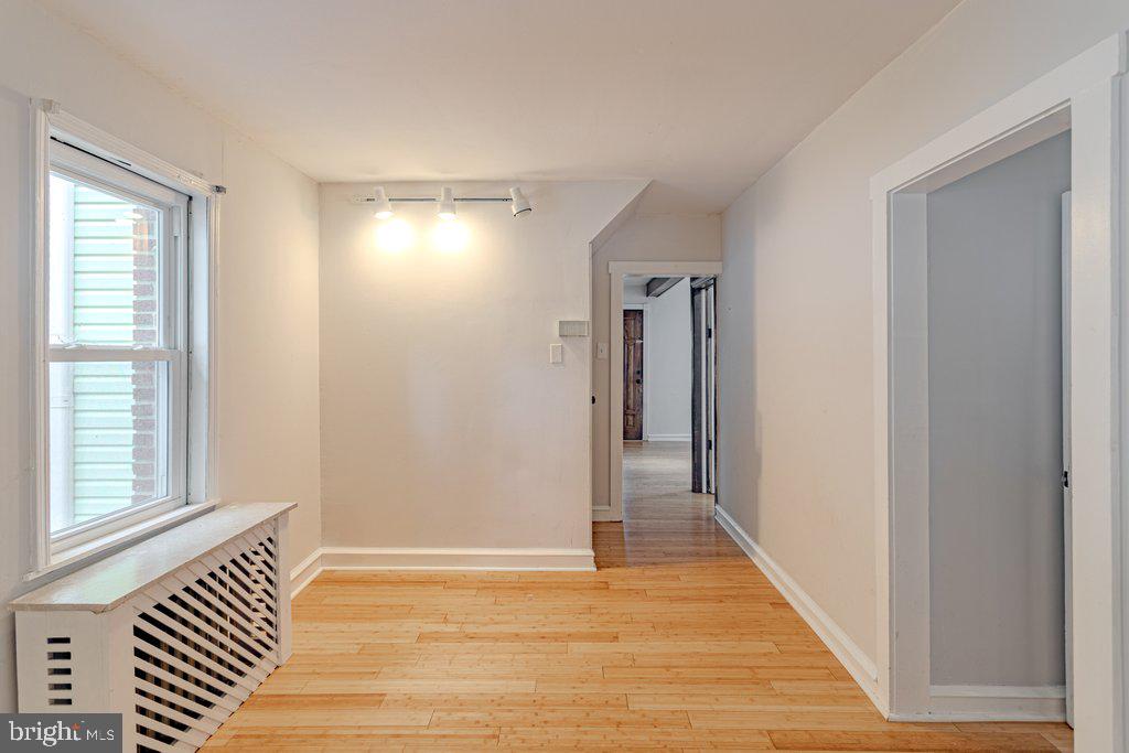 329 Union Avenue Runnemede, NJ 08078 - Photo 6 of 29 a view of a room with wooden floor and windows
