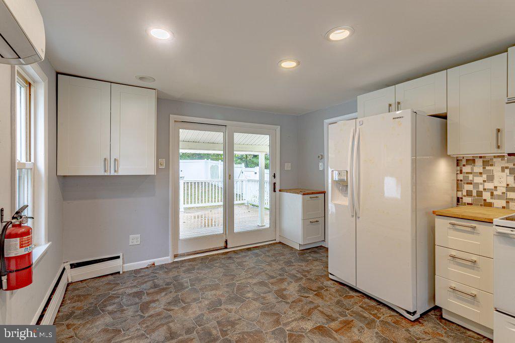 329 Union Avenue Runnemede, NJ 08078 - Photo 9 of 29 a view of a kitchen with refrigerator and cabinet