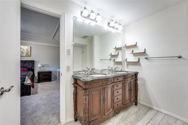 a kitchen with a stove and cabinets