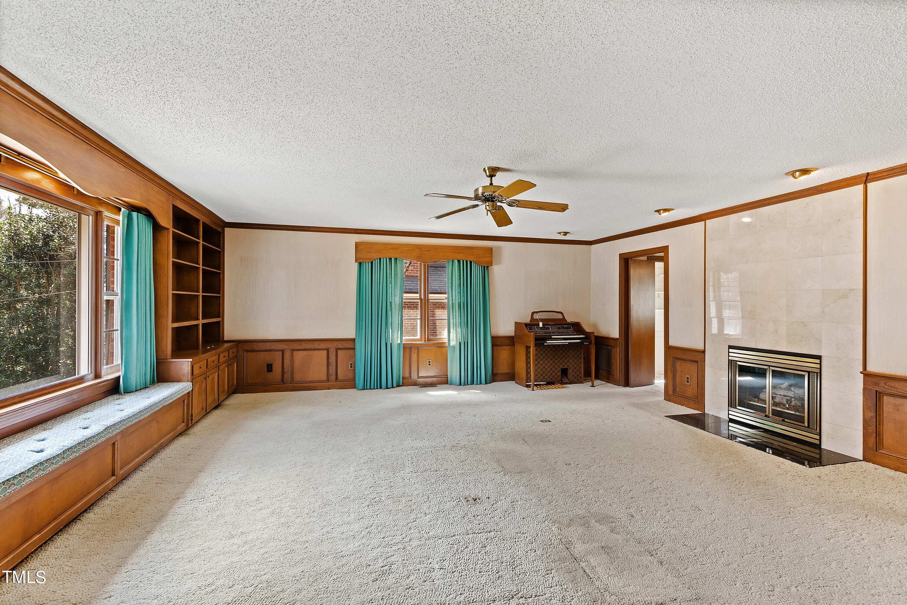 1725 Brooks Avenue Raleigh, NC 27607 - Photo 12 of 42 a view of a livingroom with furniture fire place and windows