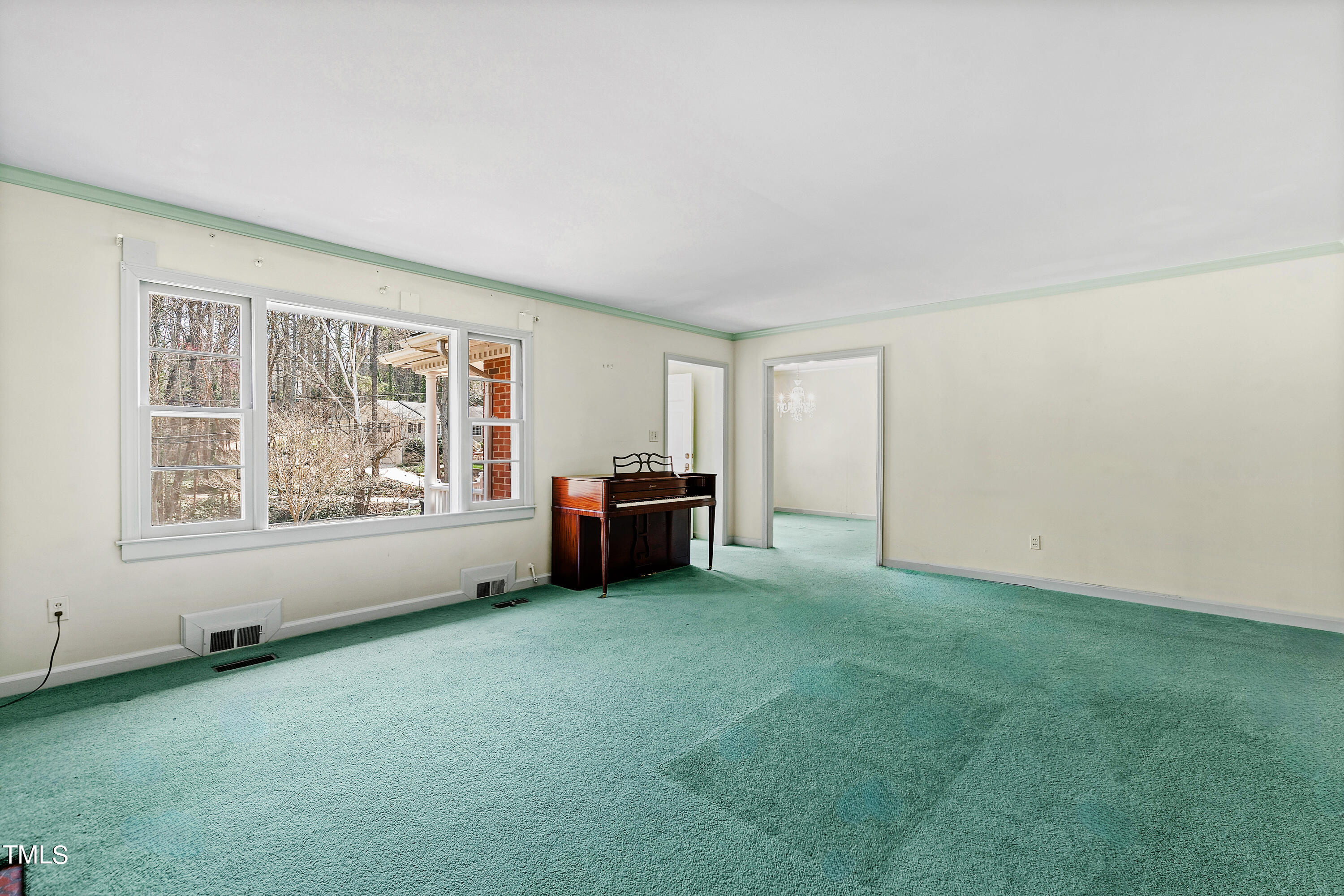 1725 Brooks Avenue Raleigh, NC 27607 - Photo 15 of 42 a living room with furniture and a open kitchen view