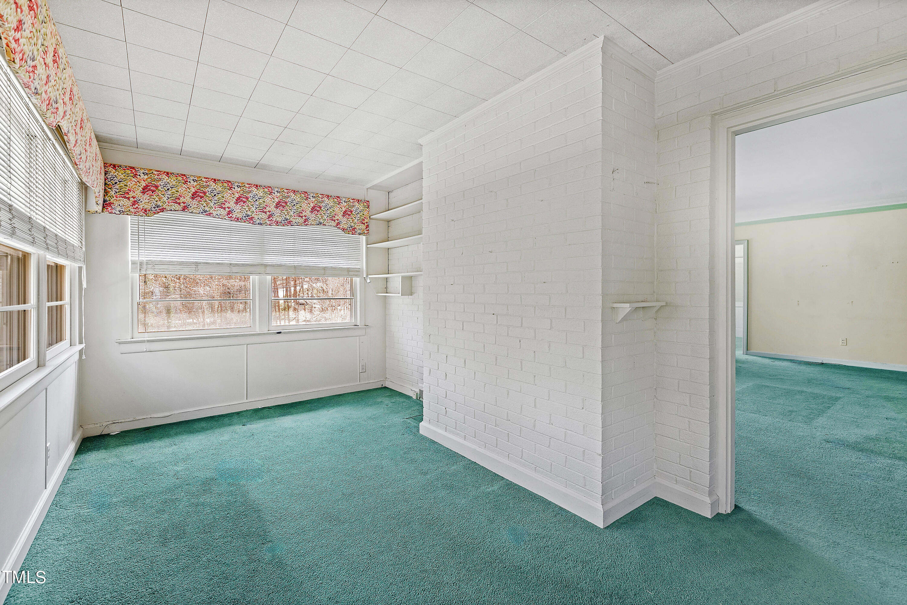 1725 Brooks Avenue Raleigh, NC 27607 - Photo 18 of 42 a view of an empty room with window