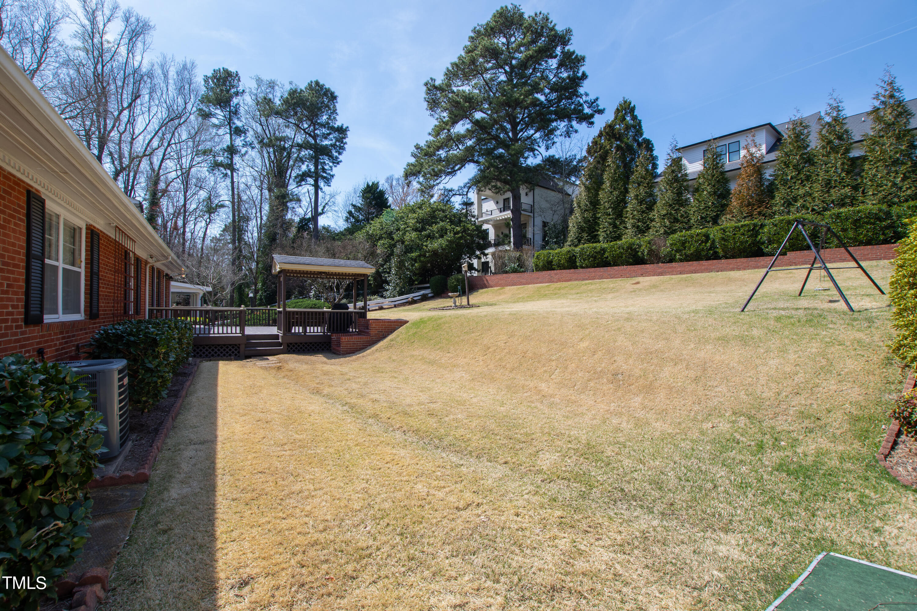 1725 Brooks Avenue Raleigh, NC 27607 - Photo 22 of 42 a view of a yard with plants and trees
