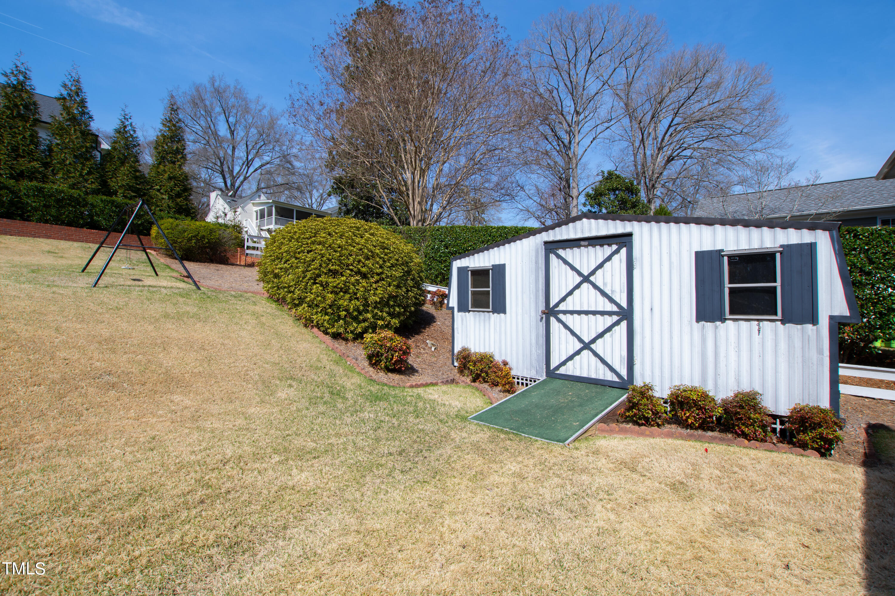 1725 Brooks Avenue Raleigh, NC 27607 - Photo 25 of 42 a view of a house with backyard and a tree