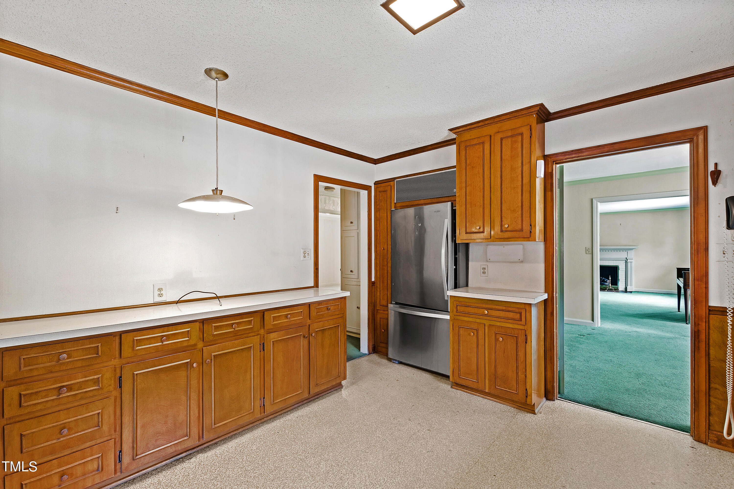 1725 Brooks Avenue Raleigh, NC 27607 - Photo 9 of 42 a kitchen with stainless steel appliances granite countertop a refrigerator and a sink