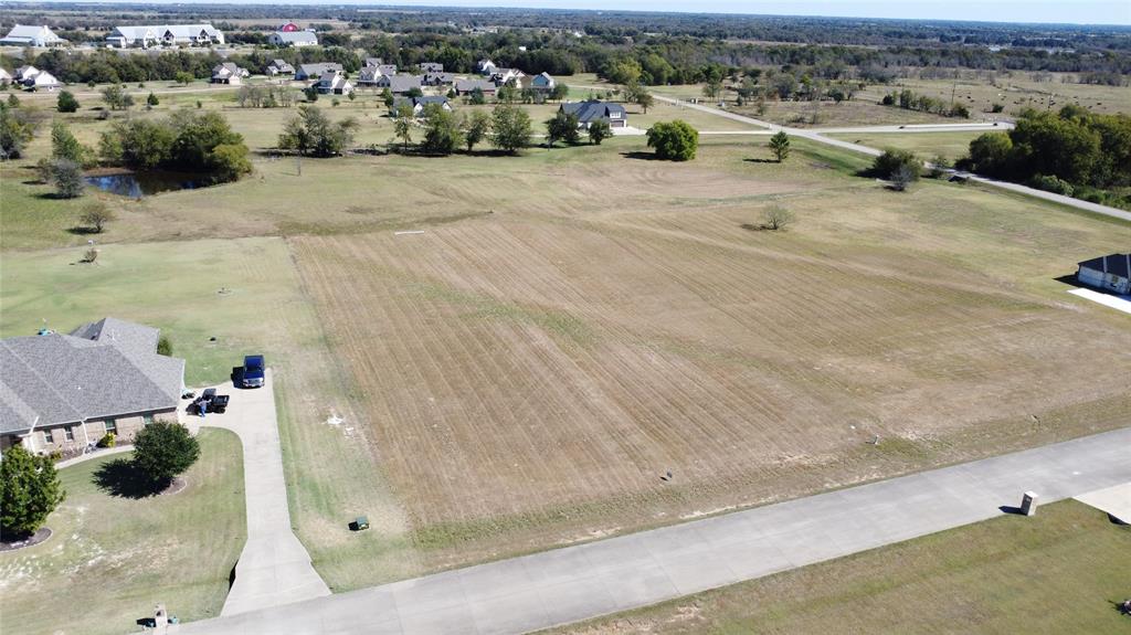 1044 Canyon Lake Road Wills Point, TX 75169 - Photo 2 of 10 an aerial view of a house with a yard