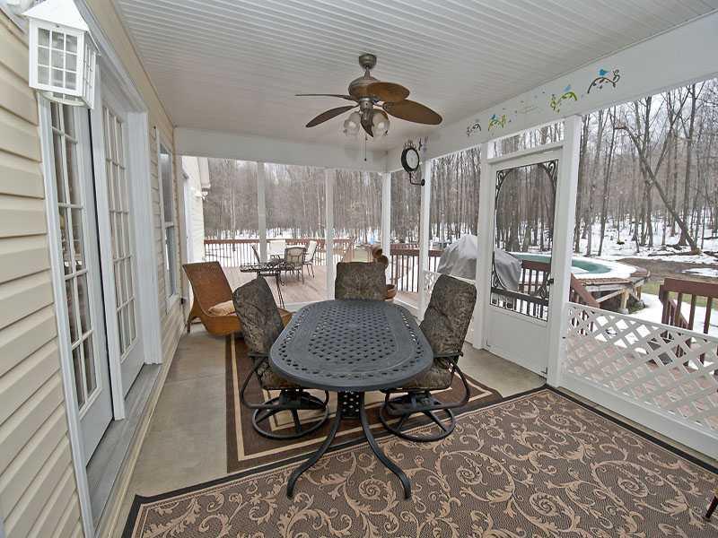 1291 Dennison Run Road Polk, PA 16342 - Photo 7 of 8 Patio/Deck. Screened in Porch