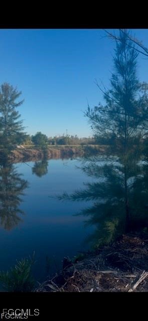 3666 Stabile Road St. James City, FL 33956 - Photo 2 of 8 a view of lake with mountain