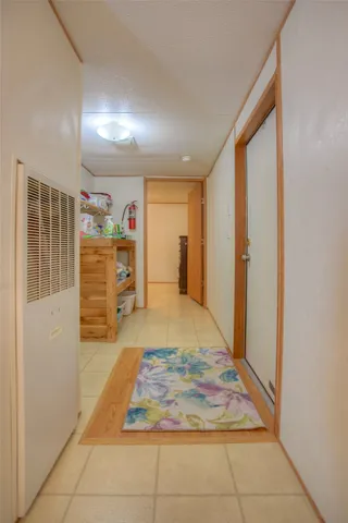 a bedroom with a bed and a cabinets