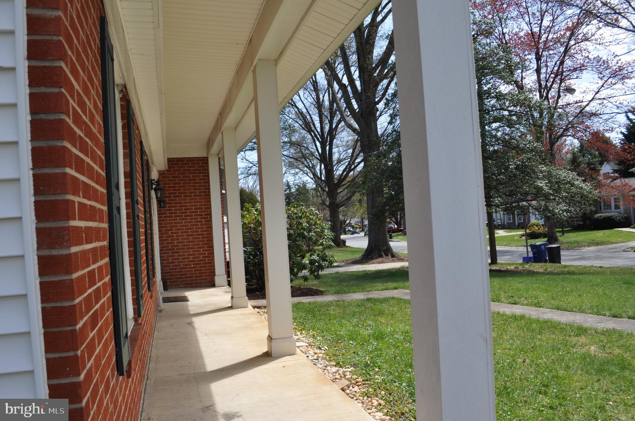 11809 Milbern Drive Potomac, MD 20854 - Photo 29 of 36 a view of a house with a yard