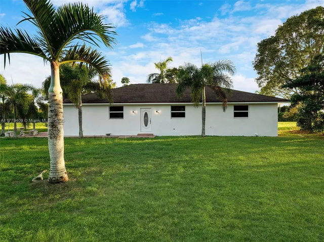 a view of a backyard with a plants