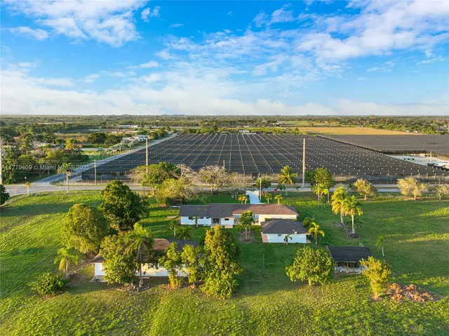 a view of swimming pool from a balcony