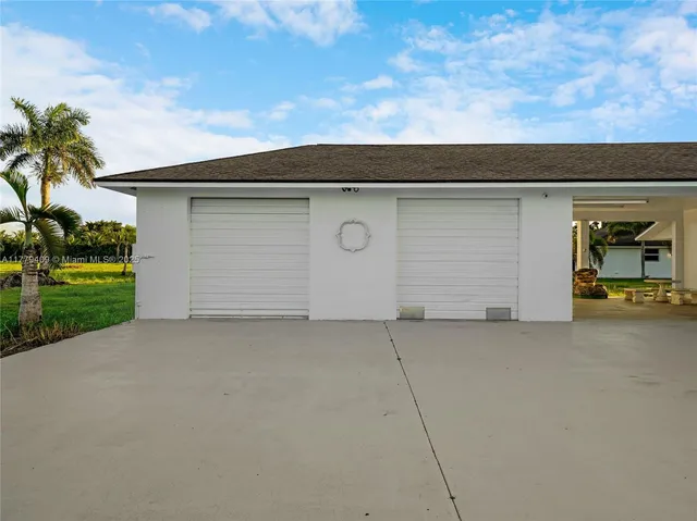 front view of a house with a garage