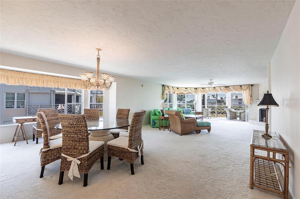 11000 Placida Road, Unit 1501 Placida, FL 33946 - Photo 14 of 46 a view of a livingroom with furniture and floor to ceiling window