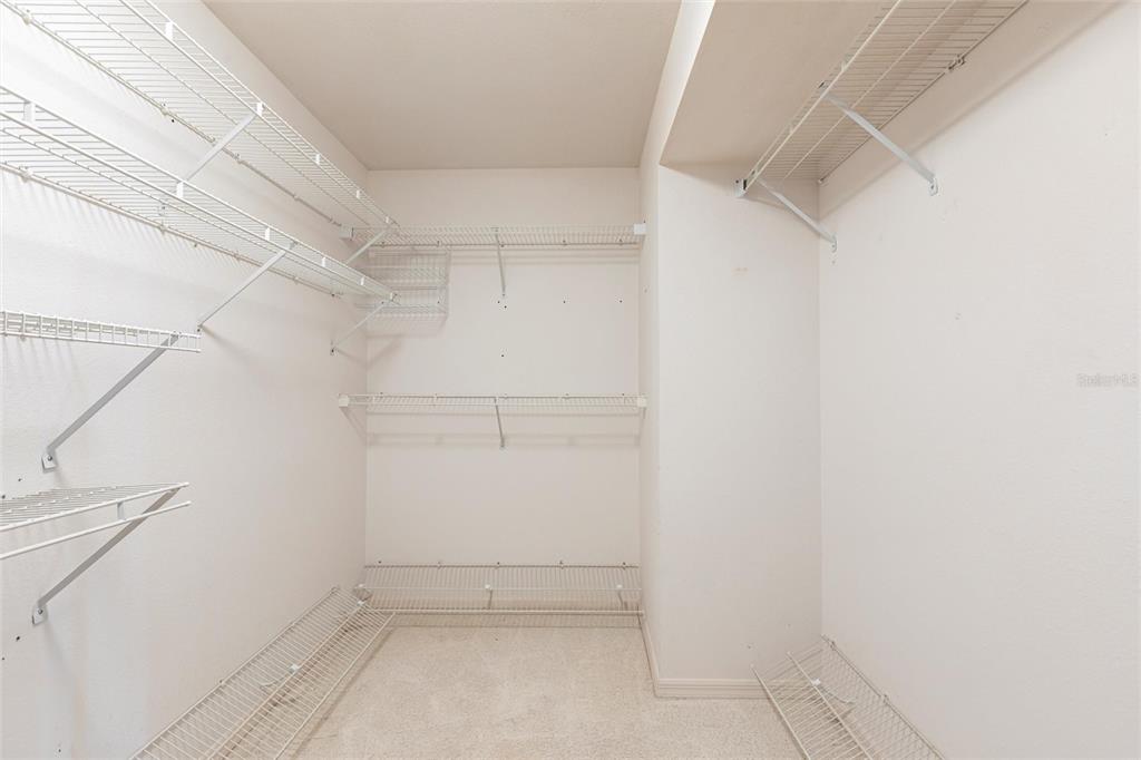 11000 Placida Road, Unit 1501 Placida, FL 33946 - Photo 20 of 46 a view of a room with racks on the wall