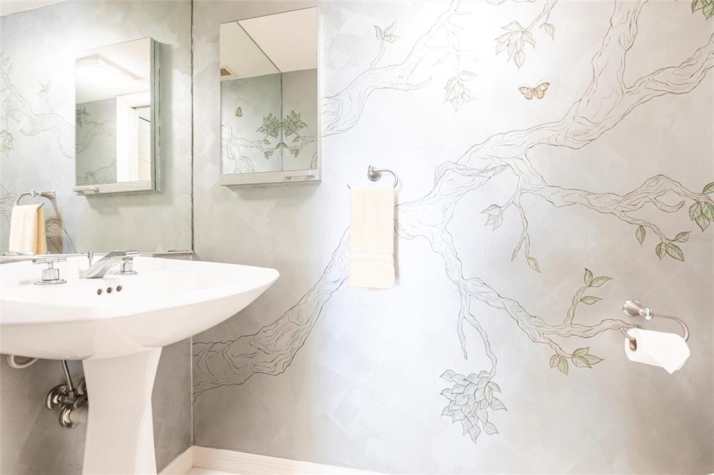 11000 Placida Road, Unit 1501 Placida, FL 33946 - Photo 29 of 46 a bathroom with a sink and mirror