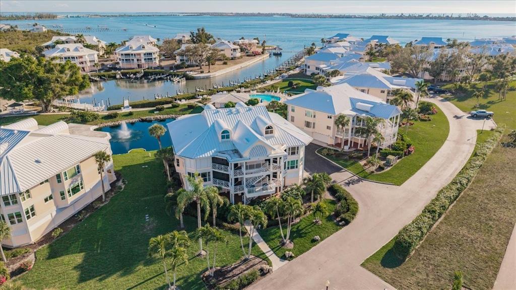 11000 Placida Road, Unit 1501 Placida, FL 33946 - Photo 44 of 46 an aerial view of a house with a garden