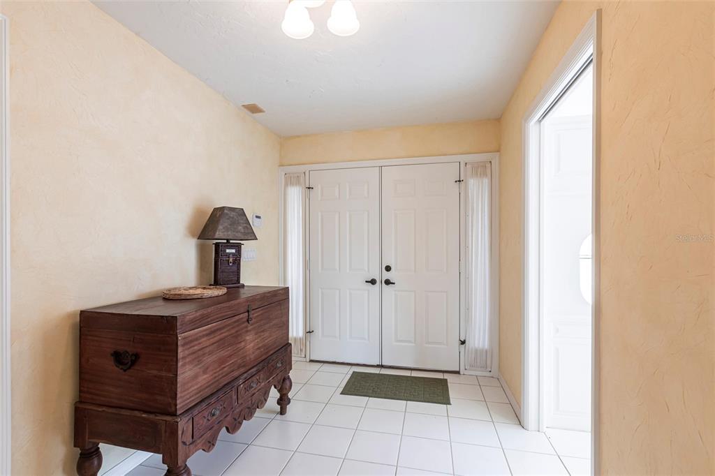 11000 Placida Road, Unit 1501 Placida, FL 33946 - Photo 6 of 46 a view of hallway with washer and dryer