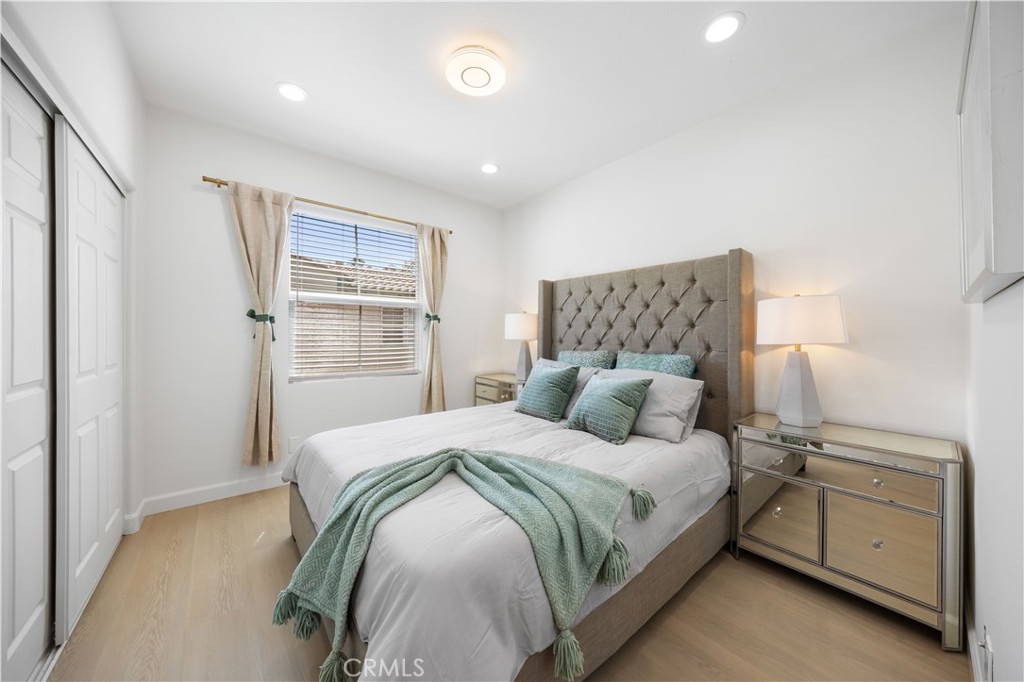 332 Quail Ridge Irvine, CA 92603 - Photo 11 of 25 a bedroom with a bed and a window