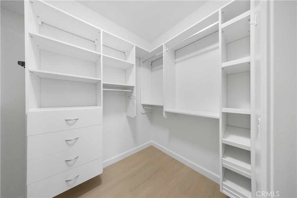 332 Quail Ridge Irvine, CA 92603 - Photo 15 of 25 a view of an empty walk in closet