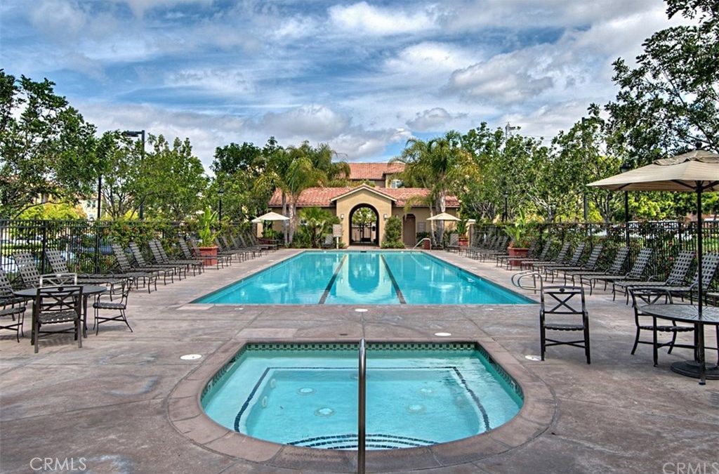 332 Quail Ridge Irvine, CA 92603 - Photo 18 of 25 a view of a swimming pool with a patio