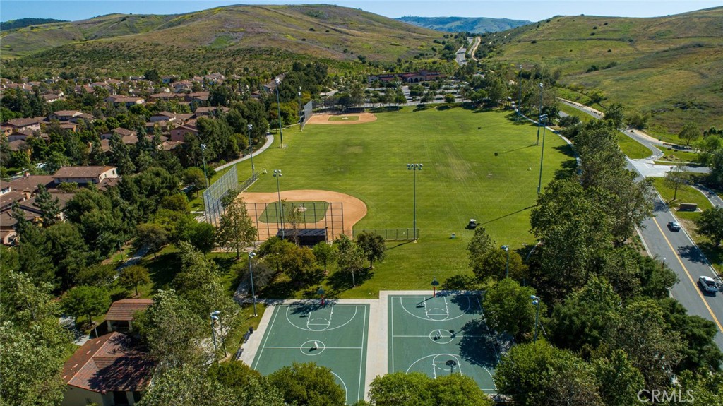 332 Quail Ridge Irvine, CA 92603 - Photo 23 of 25 an aerial view of a house with a yard