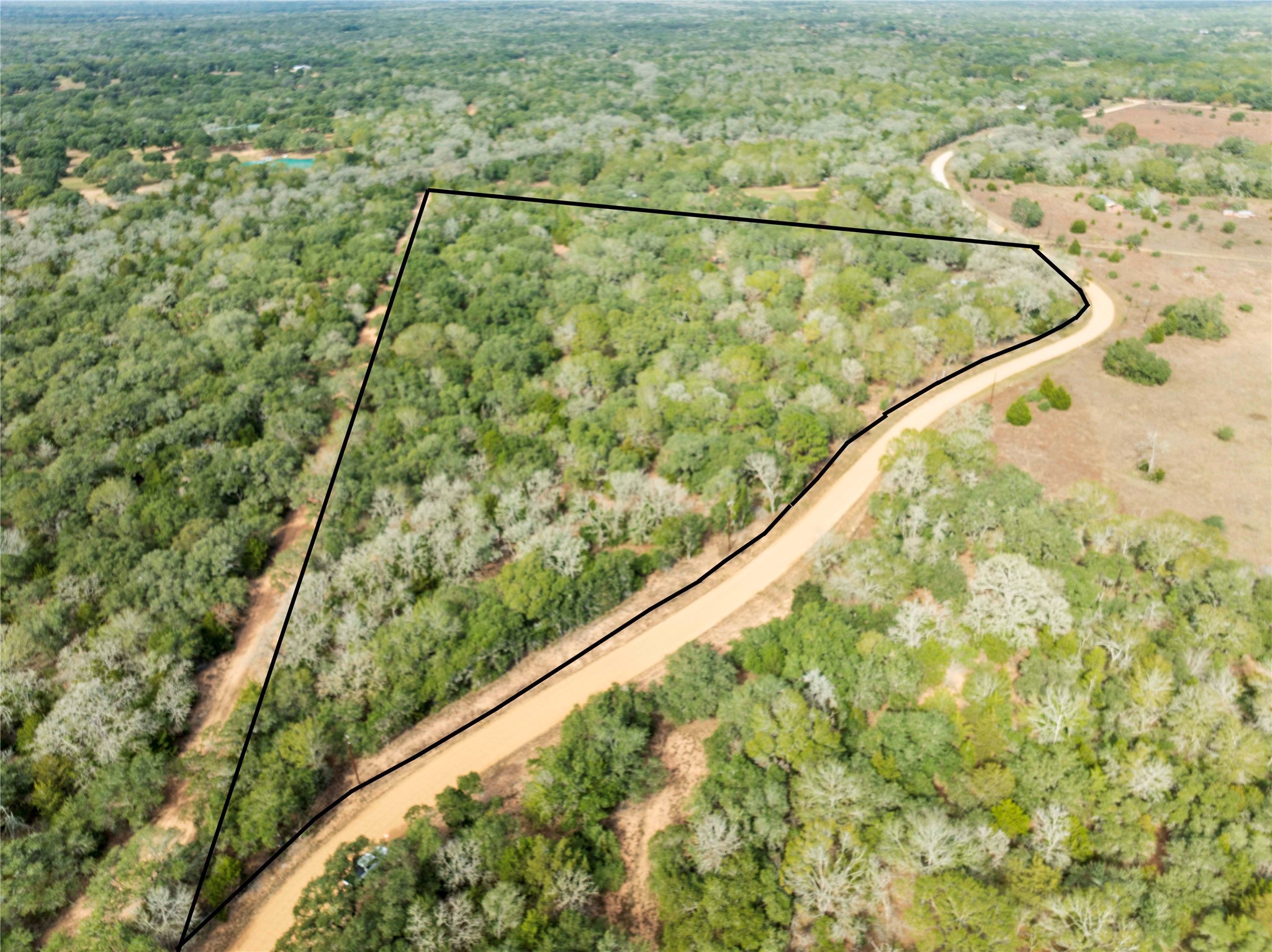 a view of a yard from a balcony